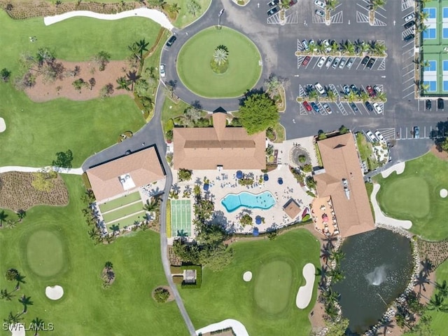 birds eye view of property with golf course view