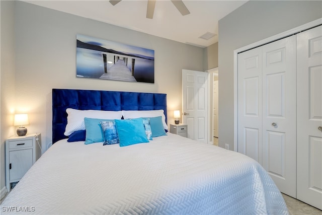 bedroom featuring ceiling fan and a closet