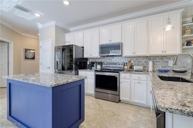 kitchen featuring white cabinetry, sink, and stainless steel appliances