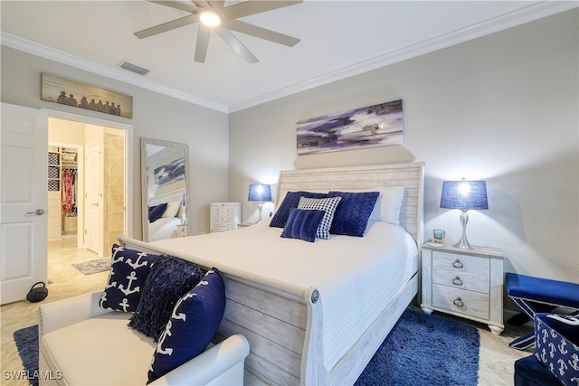 bedroom with ornamental molding, a spacious closet, ceiling fan, and a closet