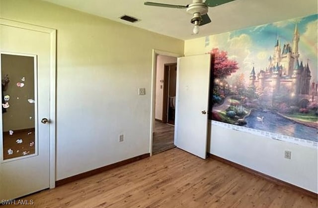 unfurnished bedroom featuring light hardwood / wood-style floors and ceiling fan