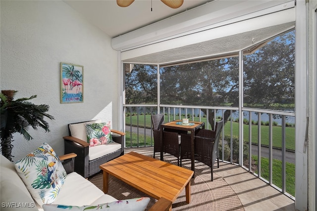 sunroom / solarium with ceiling fan