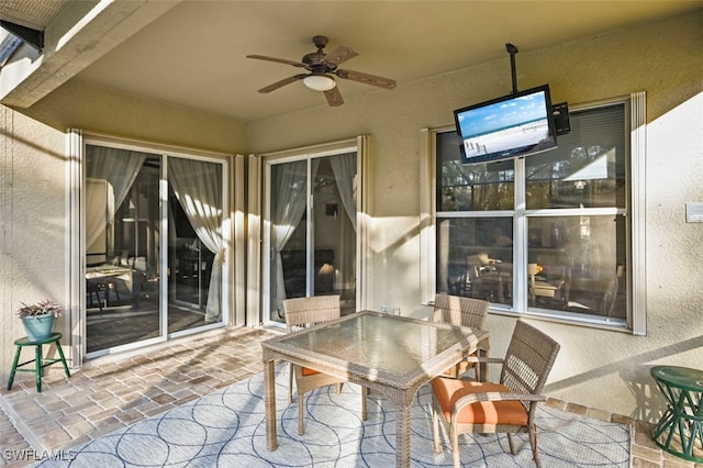 view of patio / terrace featuring ceiling fan