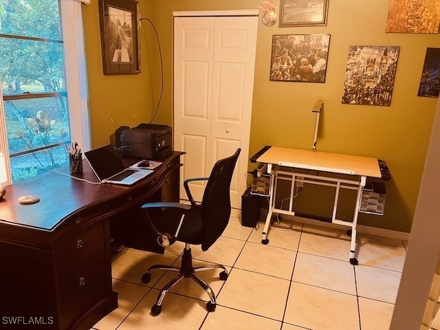 home office with light tile patterned flooring