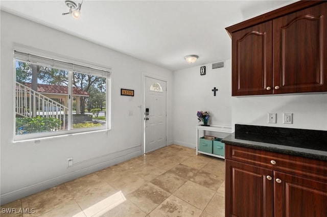 kitchen with dark stone counters