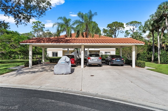 view of parking / parking lot with a carport