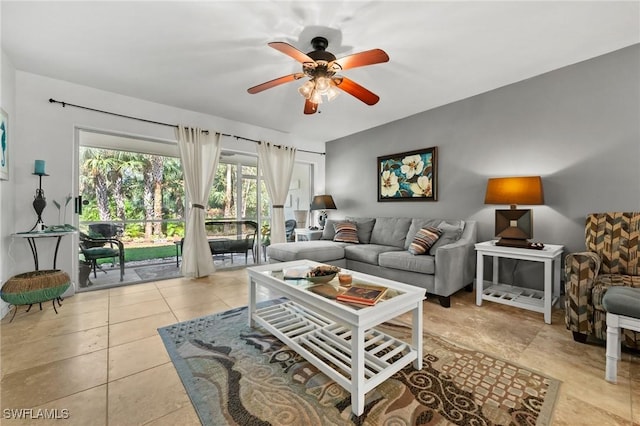 living room with ceiling fan and light tile patterned floors