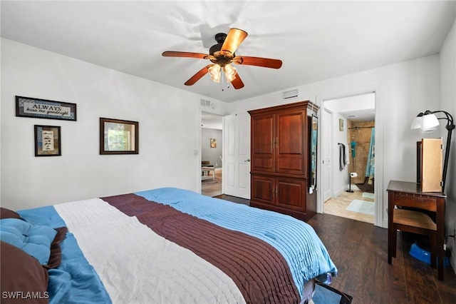 bedroom featuring ensuite bath, ceiling fan, and dark wood-type flooring