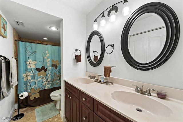 full bathroom featuring vanity, toilet, and shower / tub combo with curtain