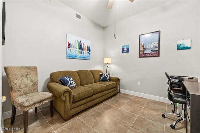 office space featuring ceiling fan and light tile patterned floors