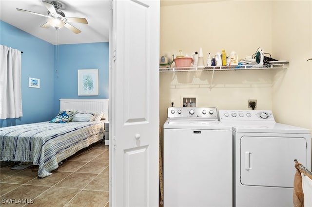 laundry area with washer and clothes dryer, ceiling fan, and light tile patterned flooring