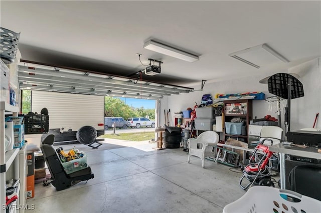 2918 12th St SW, Lehigh Acres, FL 33976 - garage featuring a garage door opener