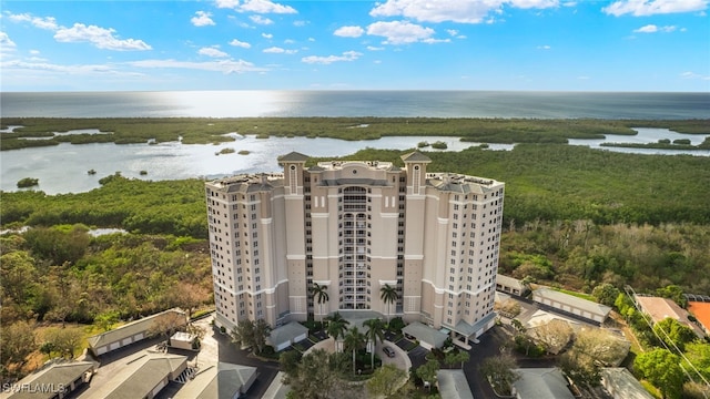 birds eye view of property featuring a water view