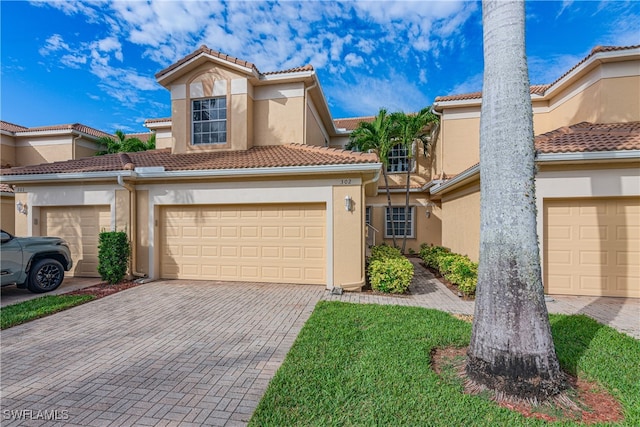 view of front of property with a garage