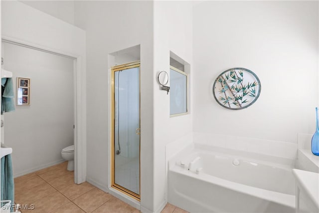 full bathroom featuring tile patterned flooring, vanity, toilet, and independent shower and bath