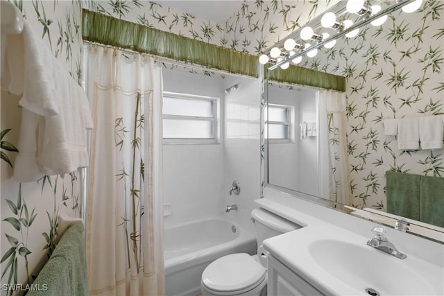 full bathroom featuring shower / bath combo, toilet, and vanity