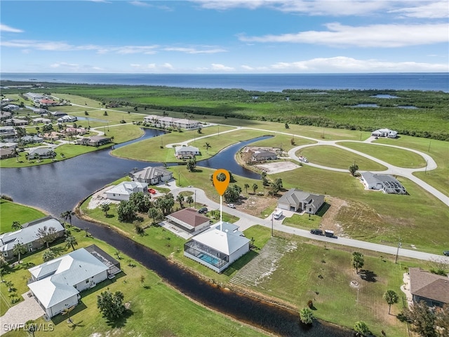 aerial view featuring a water view