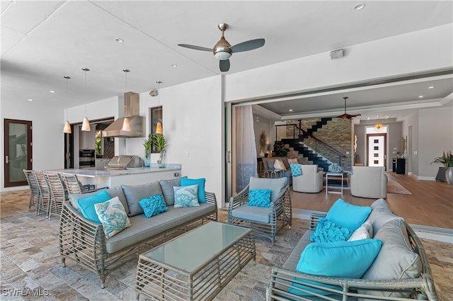 view of patio / terrace with ceiling fan, an outdoor living space, grilling area, and area for grilling