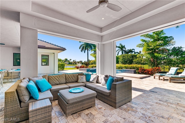 view of patio / terrace featuring ceiling fan and an outdoor hangout area