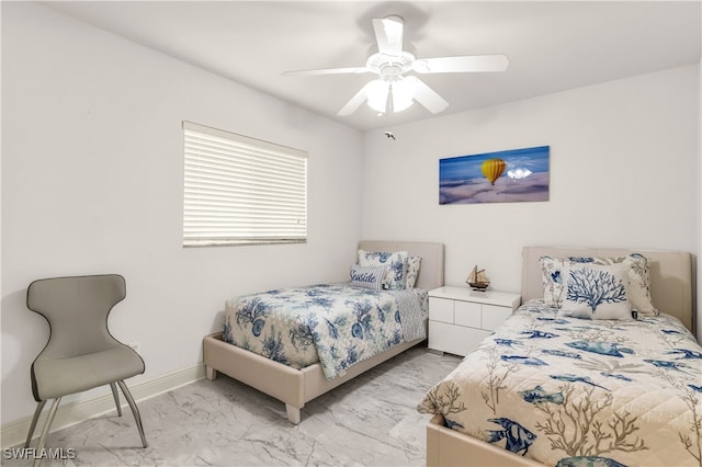 bedroom featuring ceiling fan