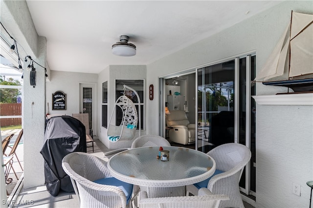 interior space featuring ceiling fan