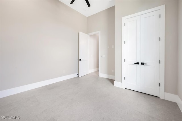 unfurnished bedroom featuring a closet and ceiling fan