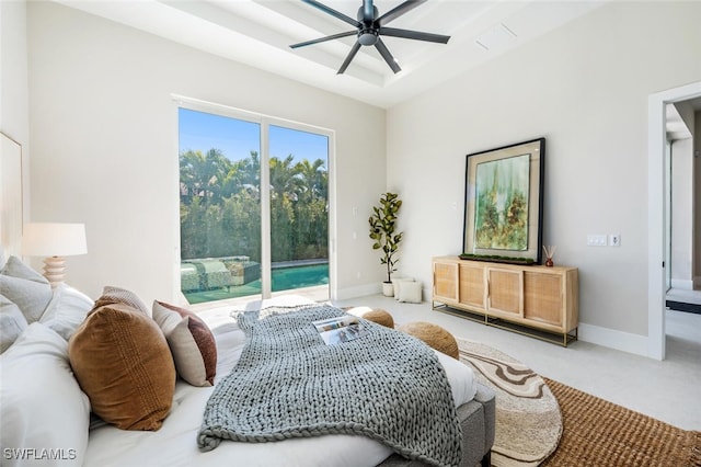 bedroom featuring ceiling fan, carpet flooring, and access to outside