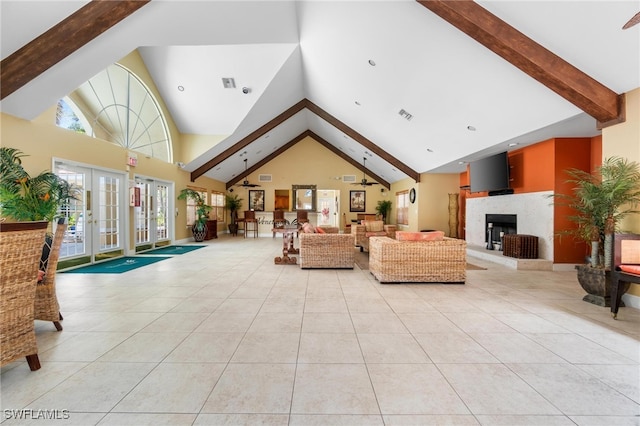 tiled living room with french doors, high vaulted ceiling, and beamed ceiling