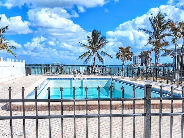 8401 Estero Blvd Unit 204, Fort Myers Beach, FL 33931 - community pool featuring fence