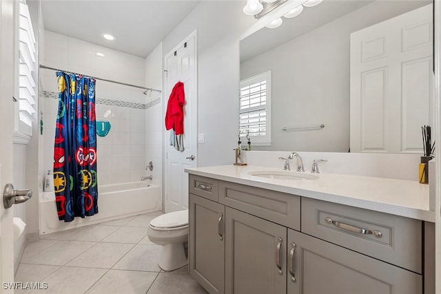 full bathroom with shower / bath combination with curtain, toilet, tile patterned flooring, and vanity