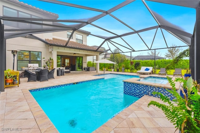 view of pool with a patio area, an outdoor living space, an in ground hot tub, and glass enclosure