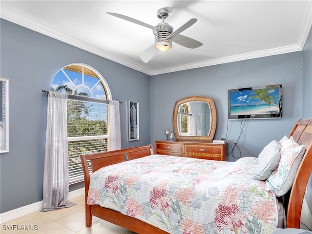 tiled bedroom with ceiling fan and ornamental molding