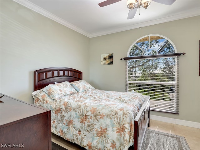 tiled bedroom featuring ceiling fan and ornamental molding