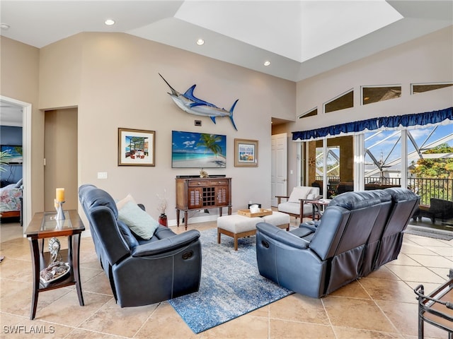 living room with high vaulted ceiling