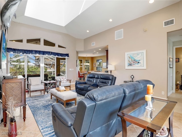 tiled living room featuring vaulted ceiling