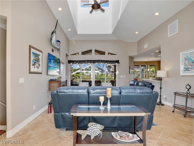 tiled living room with vaulted ceiling and ceiling fan