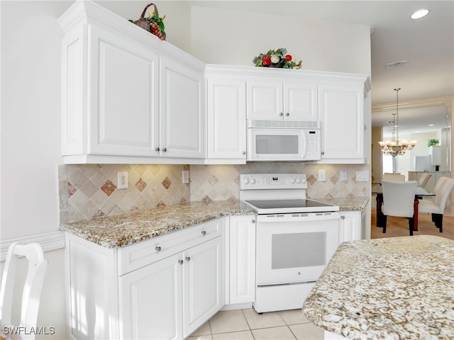 kitchen featuring light tile patterned floors, backsplash, white cabinetry, a notable chandelier, and white appliances