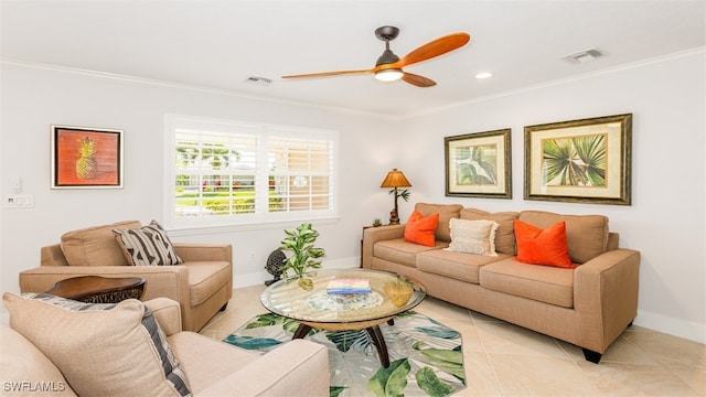 tiled living room featuring ornamental molding and ceiling fan