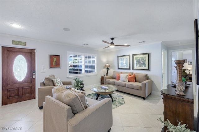 living room featuring crown molding, ceiling fan, and light tile patterned flooring