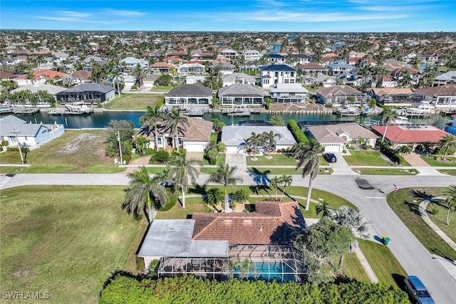 drone / aerial view with a water view