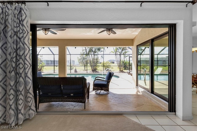 entryway with a textured ceiling and light tile patterned floors