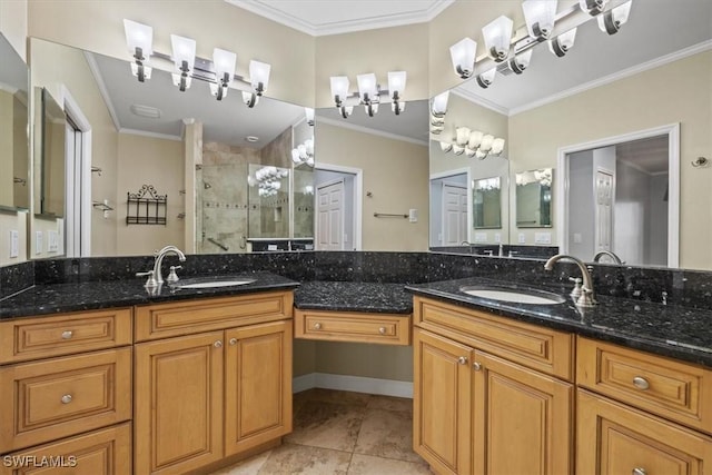 bathroom with vanity, tile patterned flooring, ornamental molding, and walk in shower