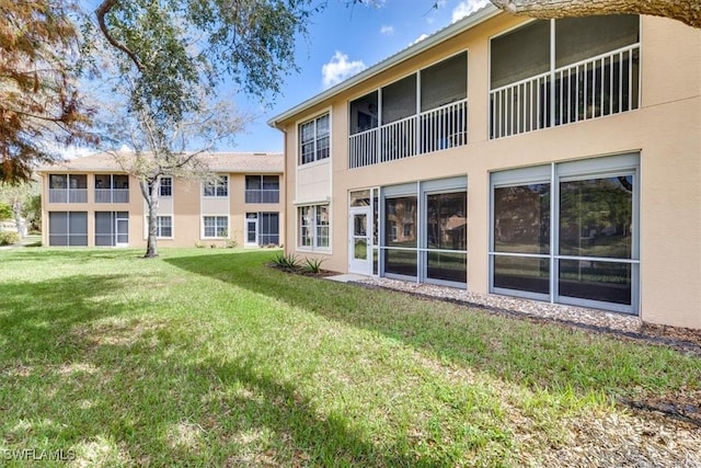 exterior space with a yard