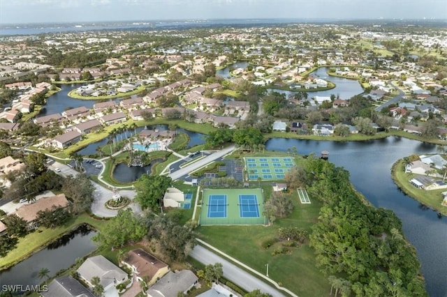 bird's eye view featuring a residential view and a water view