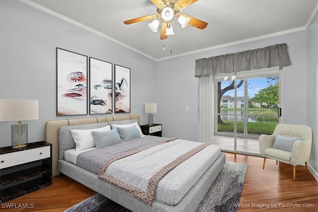 bedroom with wood finished floors, ornamental molding, a ceiling fan, and access to outside