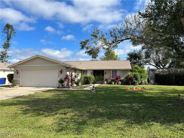 ranch-style home featuring a garage and a front lawn