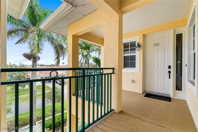 doorway to property with a balcony