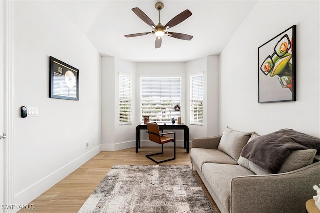 interior space featuring light wood-type flooring and ceiling fan