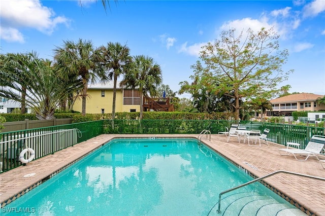 view of pool with a patio