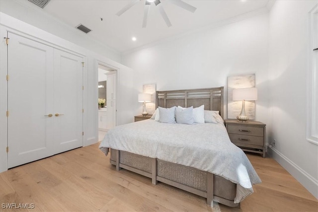 bedroom with a closet, ceiling fan, light hardwood / wood-style flooring, and ornamental molding